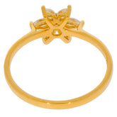 Elegant gold ring with marquise white diamonds, showcasing intricate design and luxury appeal.